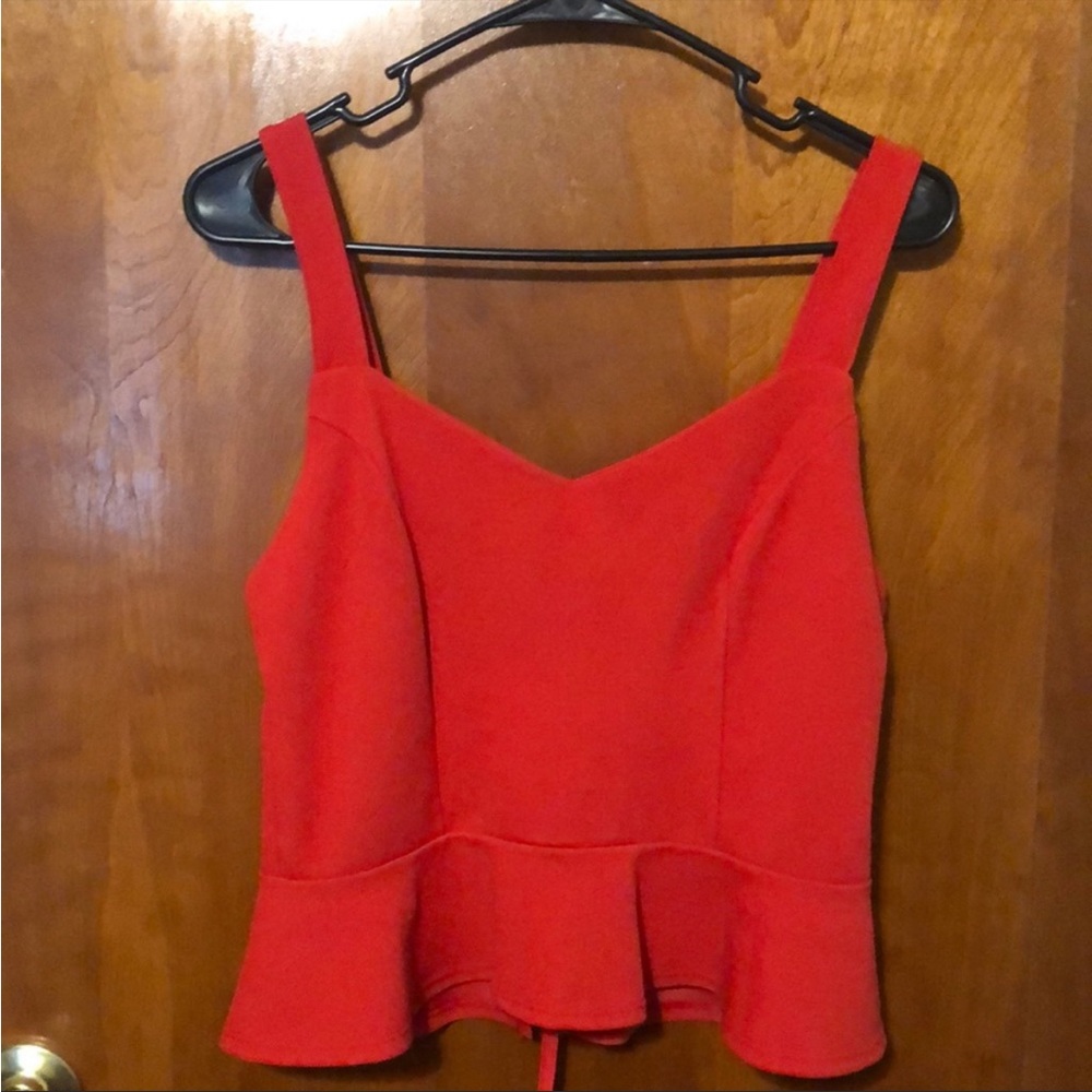 FINAL SUMMER SALE Worn three times red tied back peplum top .  good condition